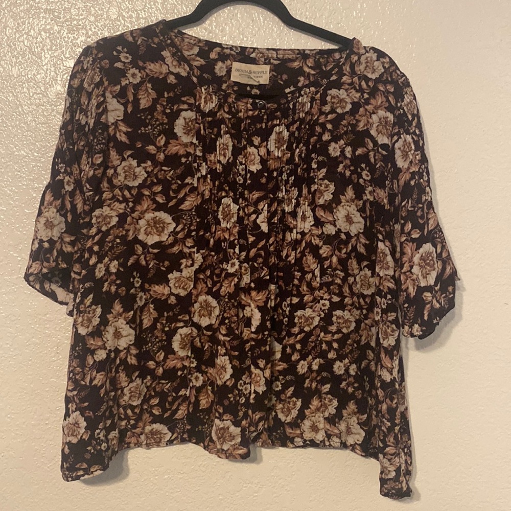 Brown floral top with pleating detail and flowy sleeves